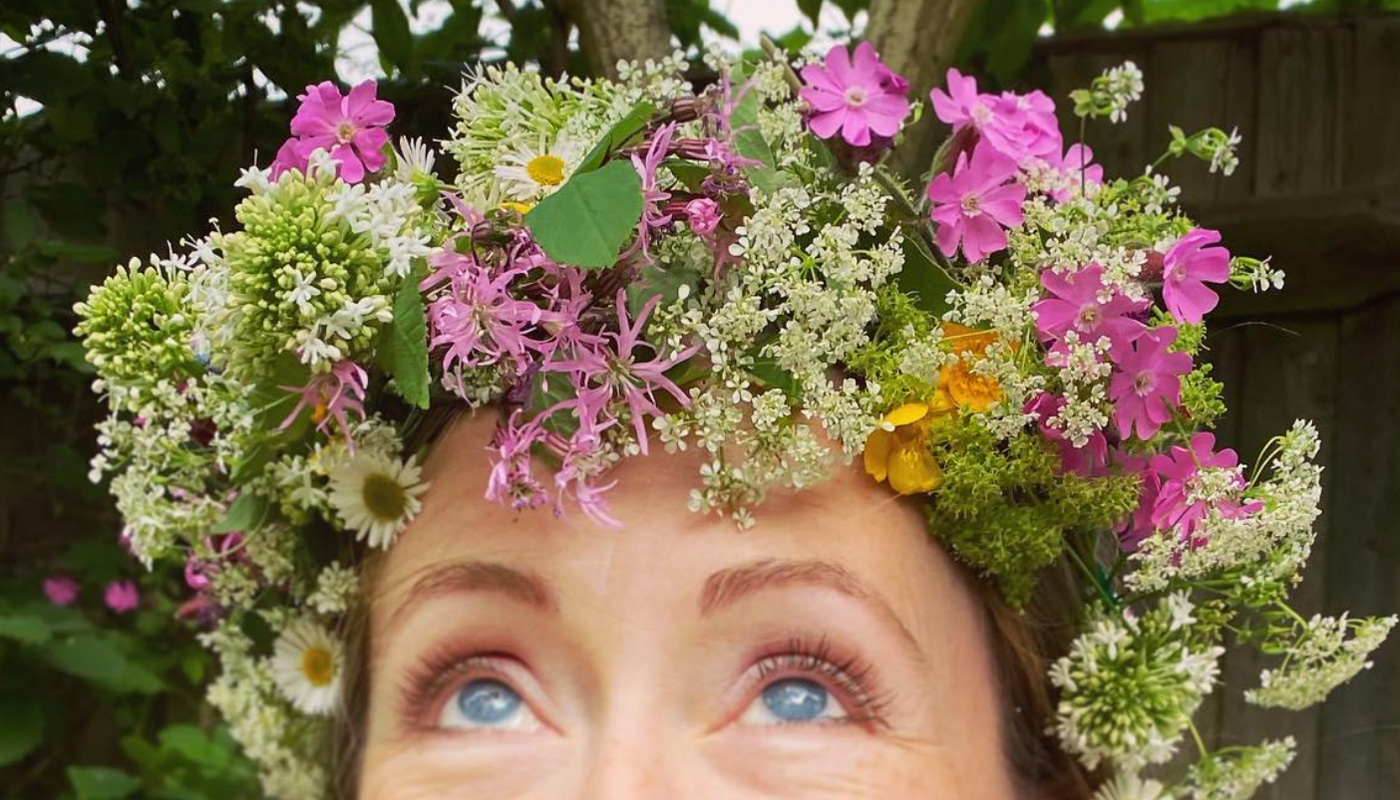Tina wearing a headdress made from wild flowers